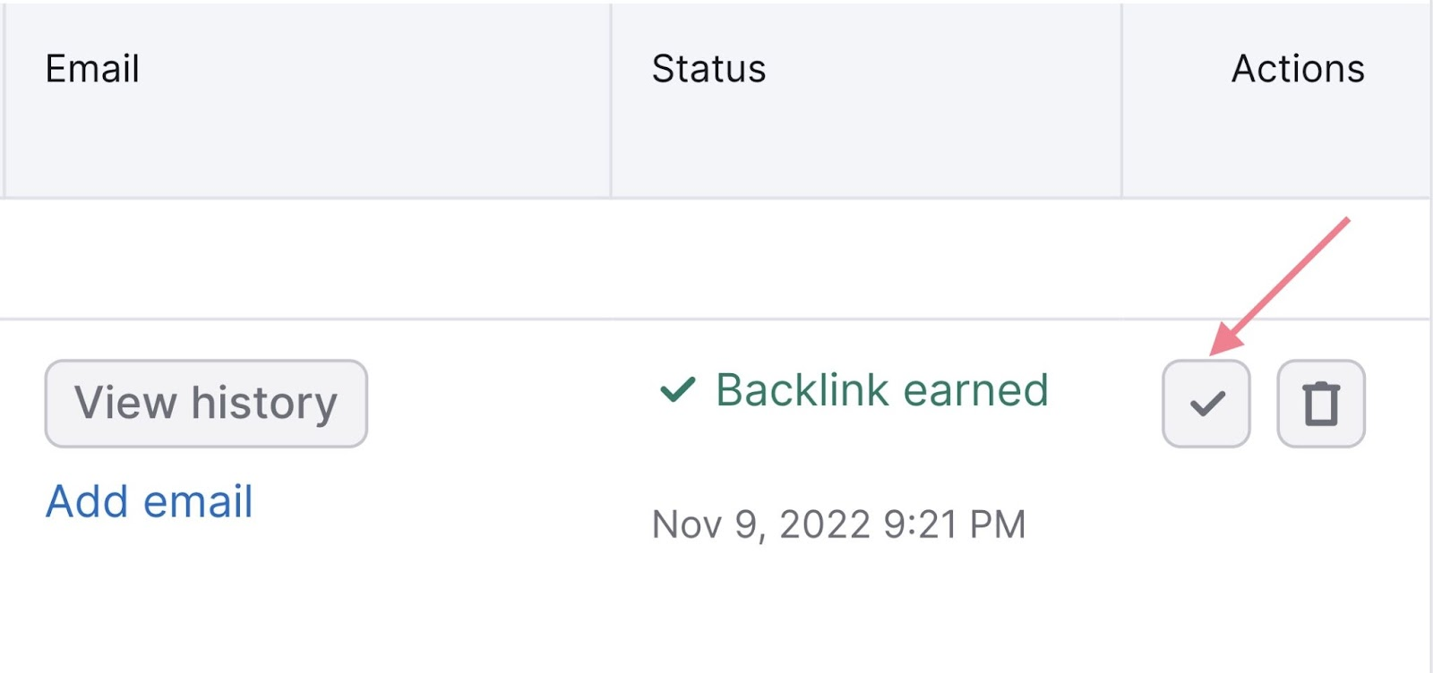 Arrow pointing to check button and status showing as 'Backlink earned' in Semrush Link Building Tool